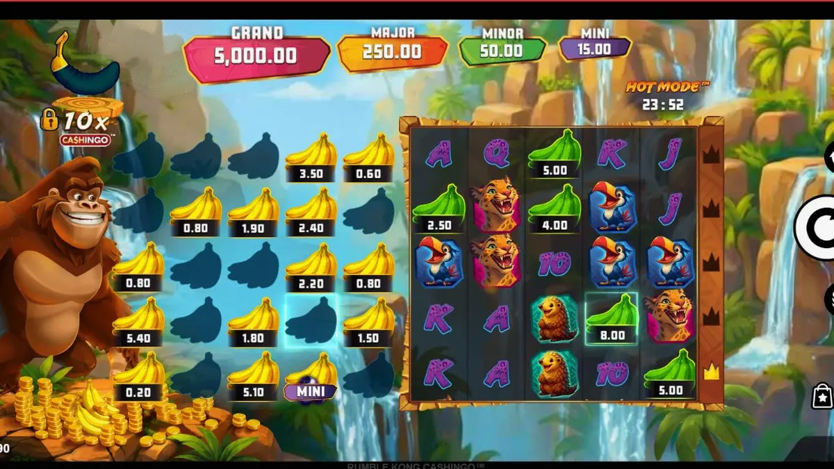 Isang mobile screen na nagpapakita ng Rumble Kong Cashingo slot na may neon city theme at dual-grid mechanics.